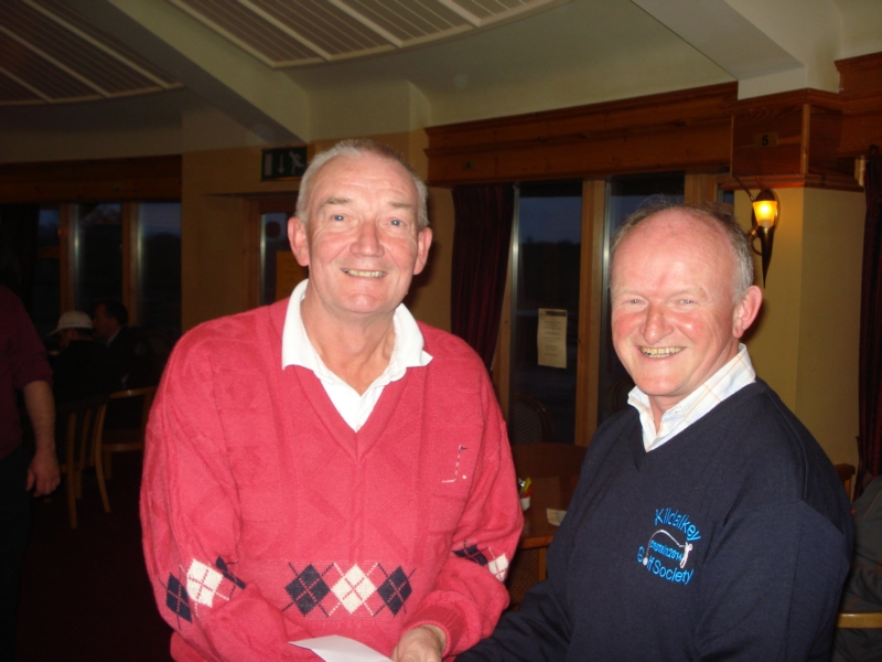 Captain Mattie Lynch presents to Rathcore winner John Darby Captain Mattie Lynch presents to Rathcore winner John Darby